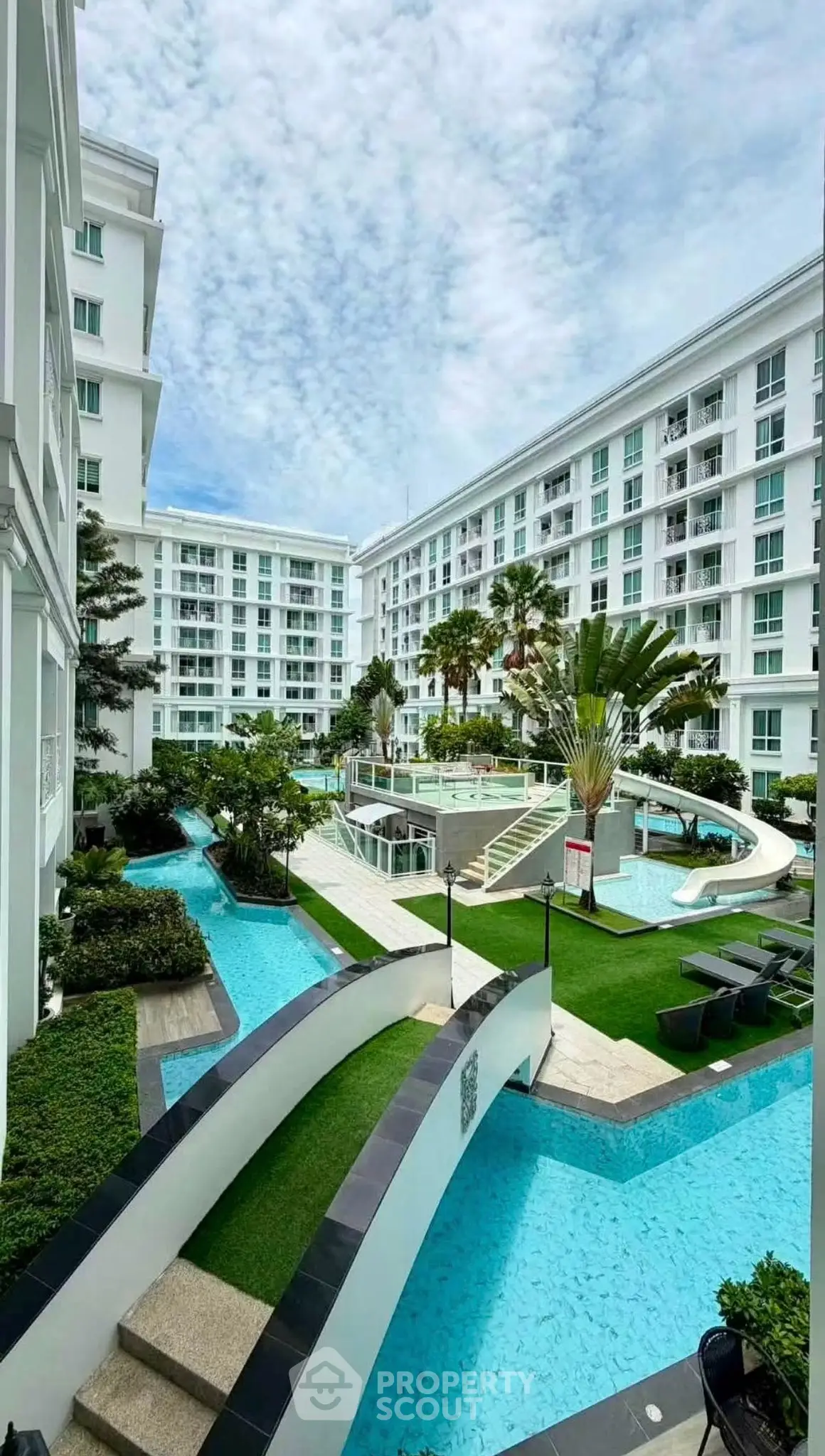 Luxurious residential complex with stunning pool and landscaped gardens