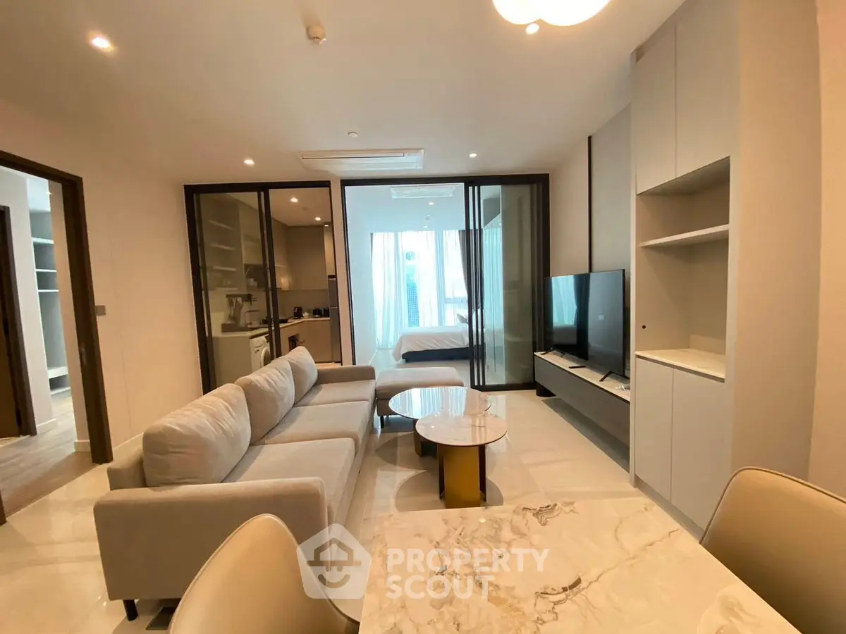 Modern living room with open layout and stylish furniture in a contemporary apartment.
