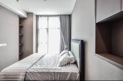 Modern bedroom with elegant decor and natural light