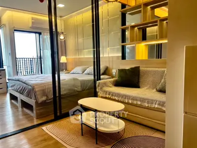 Modern studio apartment with stylish interior design and cozy living space.