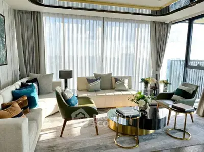 Luxurious living room with modern decor and panoramic city view