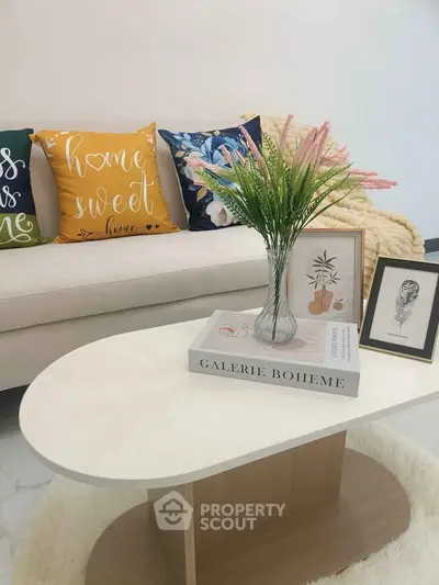 Stylish living room with modern decor and cozy sofa, perfect for relaxation and entertaining guests.