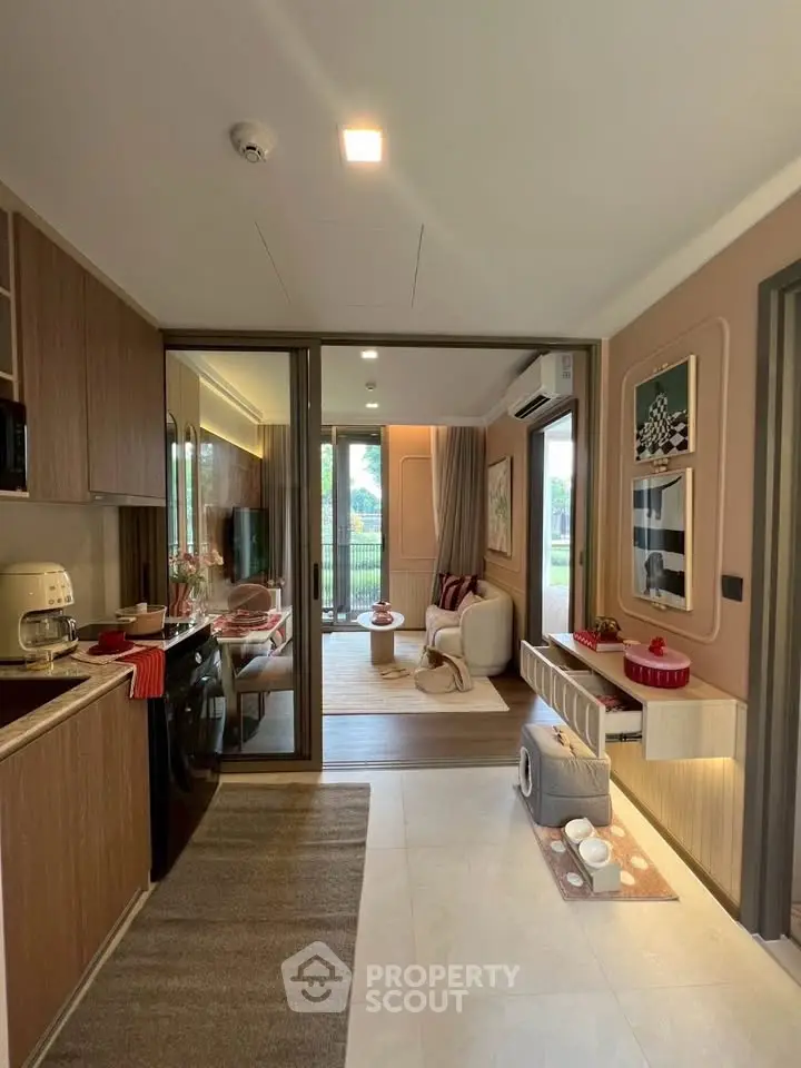 Modern open-layout living room with stylish decor and garden view