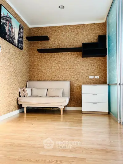 Stylish modern living room with wooden flooring and minimalist furniture