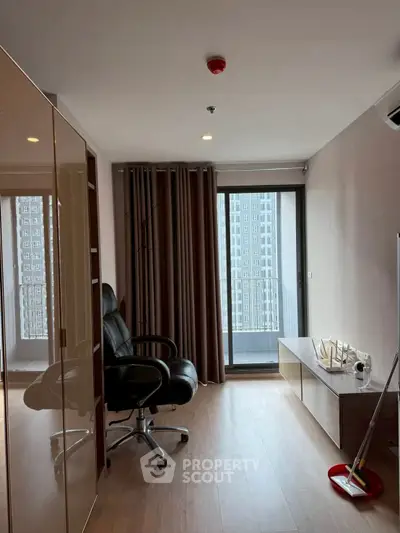 Modern study room with balcony view and sleek furnishings