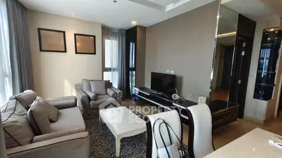 Spacious modern living room with elegant furniture and natural light