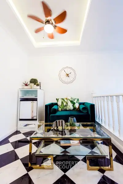 Stylish living room with modern decor and geometric flooring
