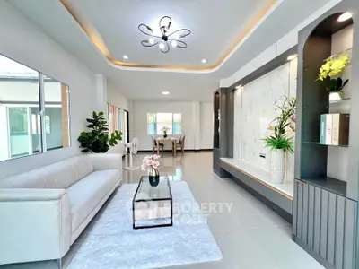 Spacious modern living room with elegant decor and natural light