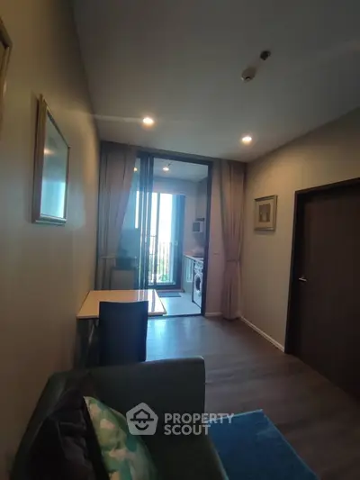 Modern apartment interior with open layout and balcony view