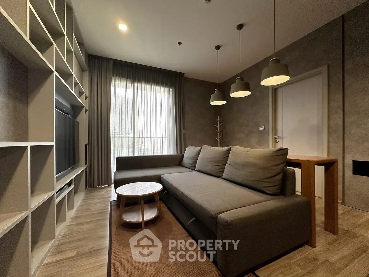 Modern living room with stylish sofa and elegant lighting