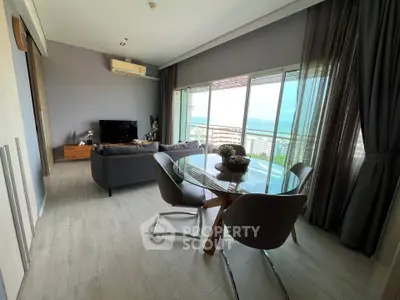 Spacious living room with stunning ocean view and modern decor
