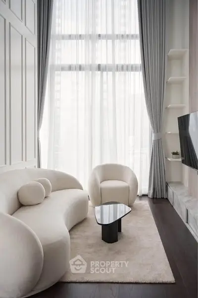 Luxurious modern living room with high ceilings and elegant furniture