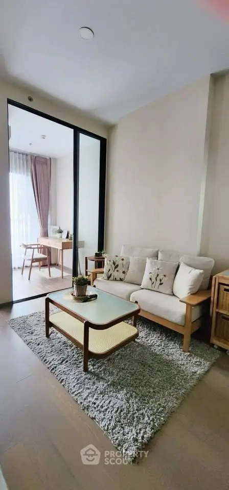 Chic modern living room with cozy seating and natural light