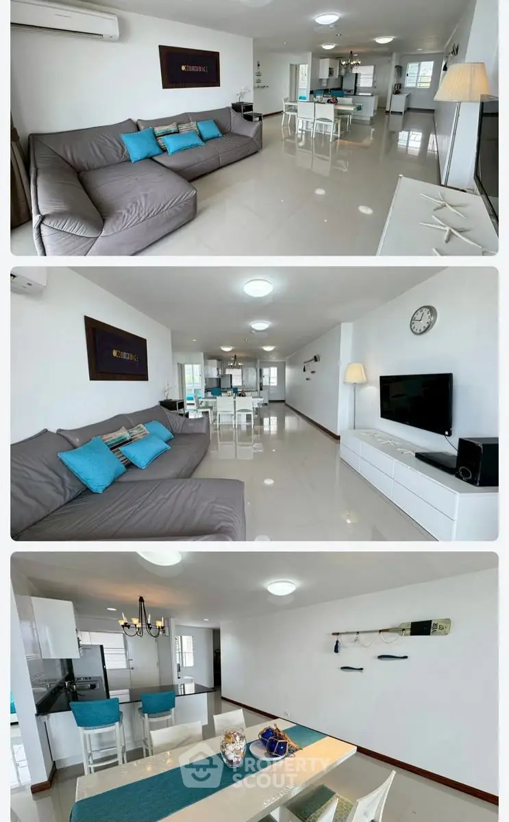 Spacious modern living room with open kitchen and stylish decor