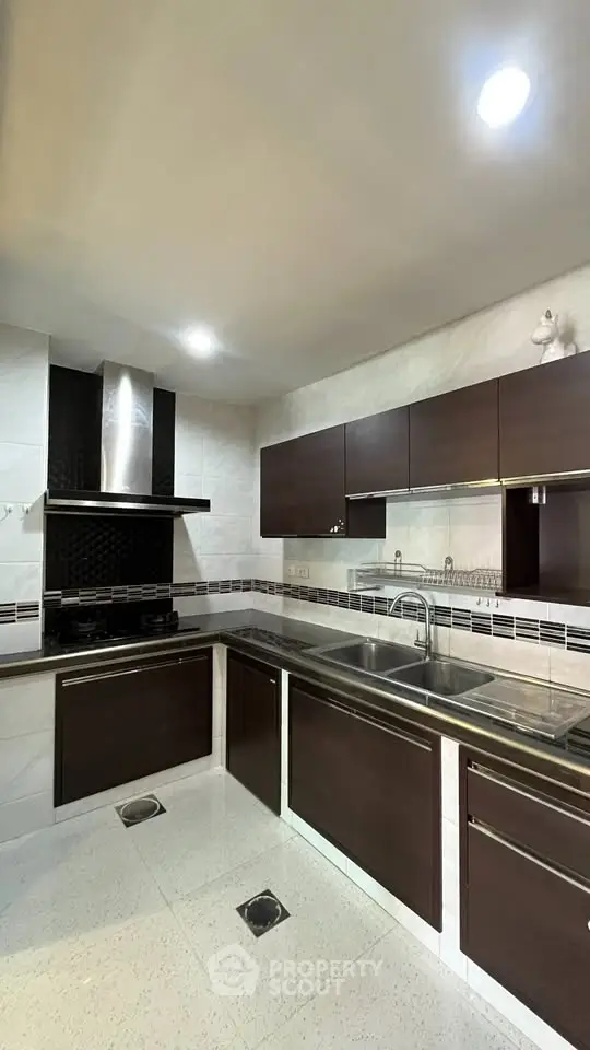 Modern kitchen with sleek cabinetry and stainless steel appliances