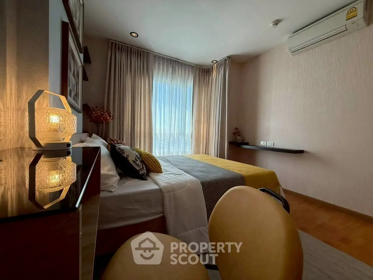 Cozy bedroom with modern decor and natural light