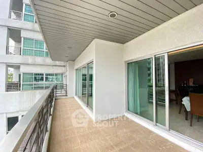 Spacious balcony with modern design in a high-rise apartment