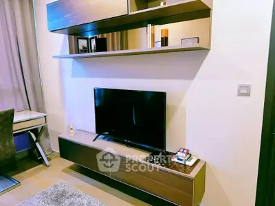 Modern living room with sleek TV unit and stylish shelving, perfect for contemporary urban living.