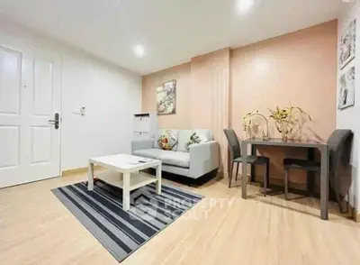 Modern living room with stylish decor and cozy seating area, perfect for relaxation and entertaining.