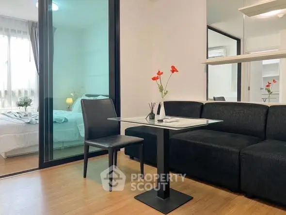 Modern apartment interior with cozy living room and bedroom view