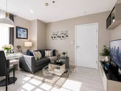 Modern living room with stylish decor and natural light, featuring a cozy sofa and elegant dining area.