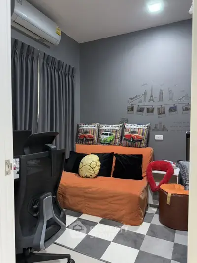 Cozy study room with modern decor and comfortable seating