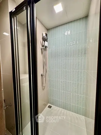 Modern bathroom with sleek shower design and glass door enclosure
