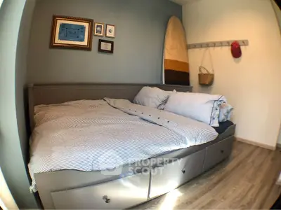 Cozy bedroom with stylish decor and ample storage space