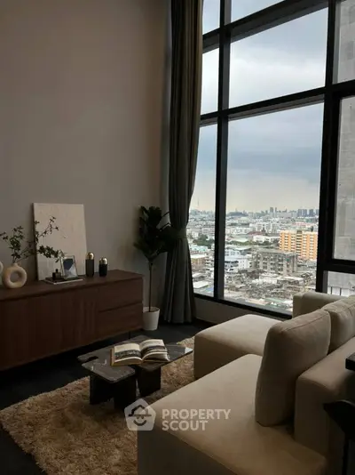 Luxurious living room with panoramic city view and elegant decor