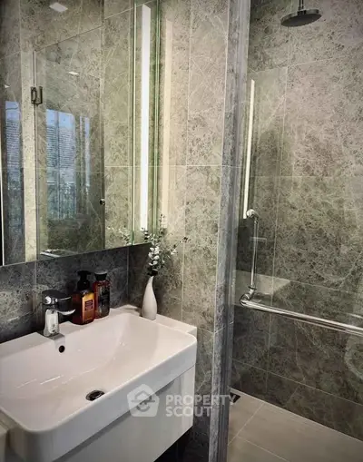 Luxurious modern bathroom with elegant marble tiles and sleek fixtures