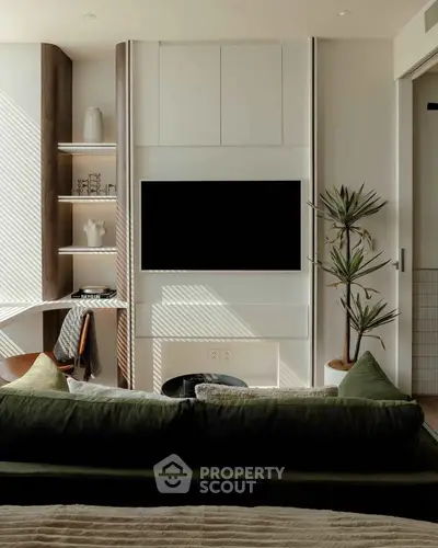 Modern living room with sleek TV setup and stylish decor