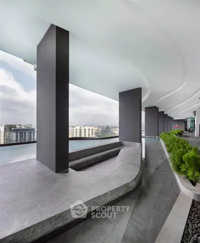 Stunning modern balcony with panoramic city views and sleek architectural design.