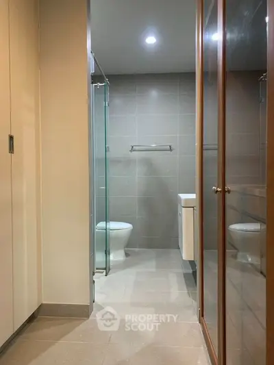 Modern bathroom with glass shower and sleek design