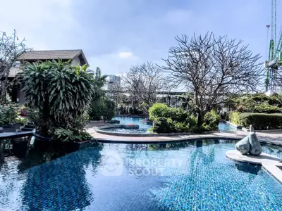 Luxurious outdoor pool area with lush greenery and serene ambiance, perfect for relaxation and leisure.