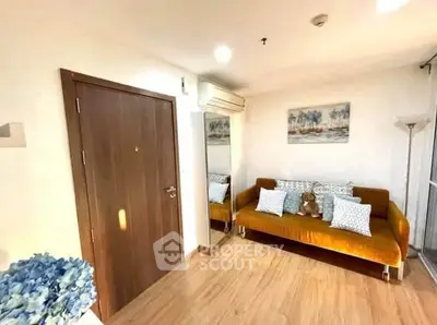 Cozy living room with stylish sofa and modern decor