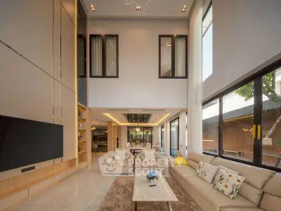 Luxurious modern living room with high ceilings and elegant decor