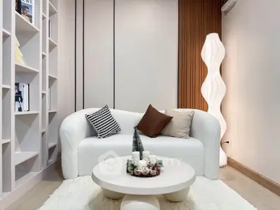 Chic modern living room with stylish sofa and unique floor lamp