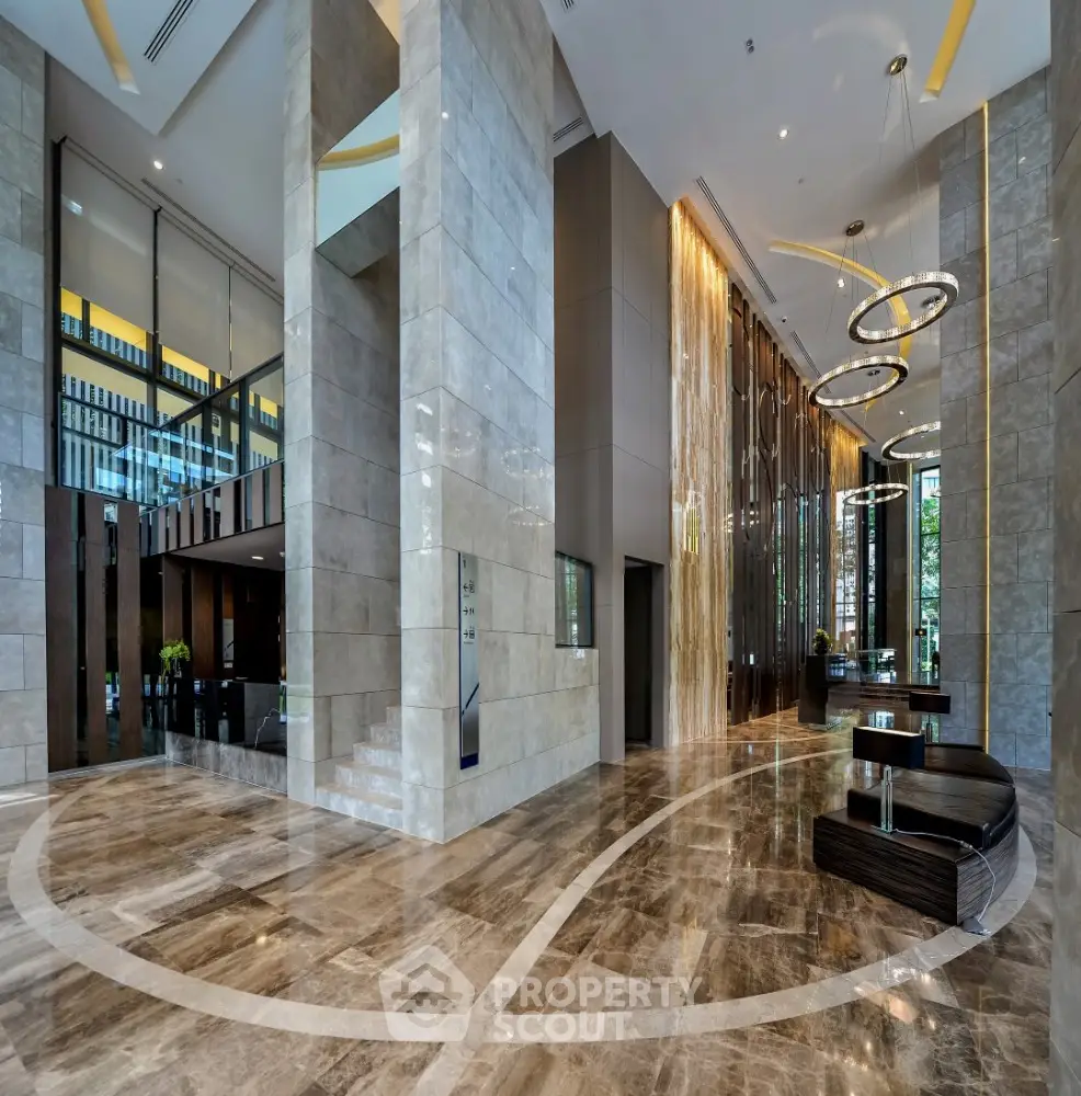 Luxurious modern building lobby with marble floors and elegant lighting