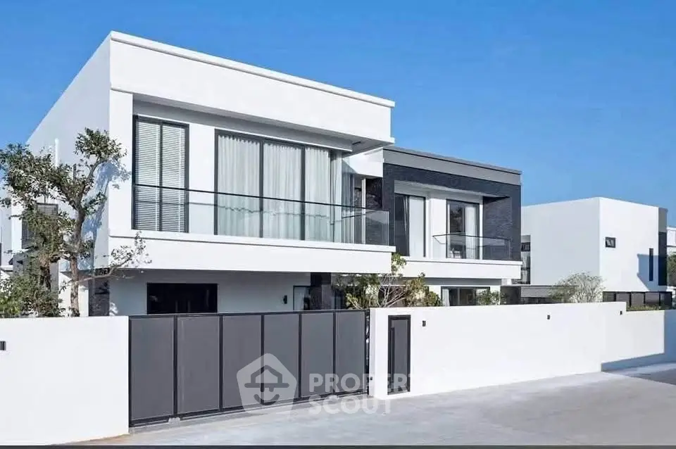 Modern luxury villa with sleek design and spacious layout in a prestigious neighborhood.