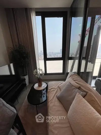 Stylish living room with city view and cozy seating area