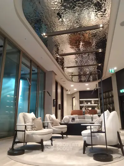 Luxurious modern living room with elegant seating and stunning ceiling design