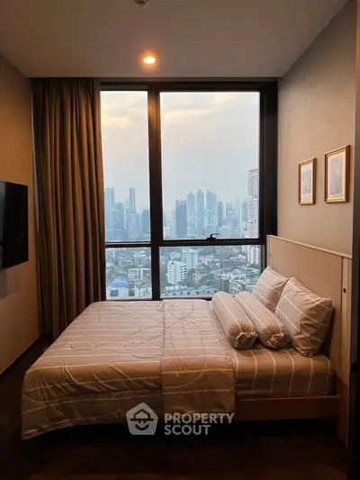 Luxurious bedroom with stunning city view and modern decor