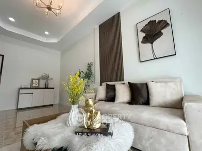 Elegant living room with modern decor and plush seating