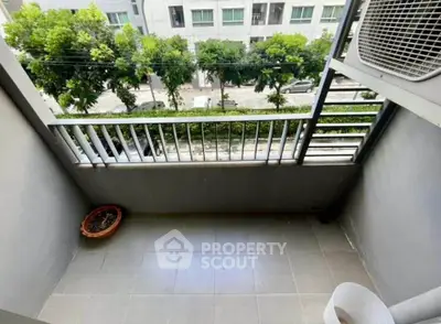 Charming balcony with street view, perfect for relaxation and enjoying fresh air.