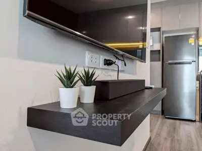 Modern living room with sleek TV setup and stylish decor