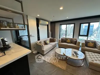 Luxurious modern living room with city view, elegant furniture, and stylish decor in high-rise apartment.