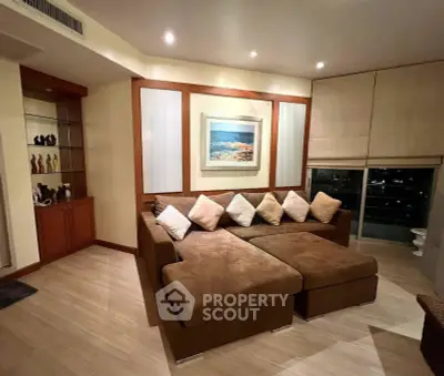 Spacious living room with cozy sectional sofa and elegant decor