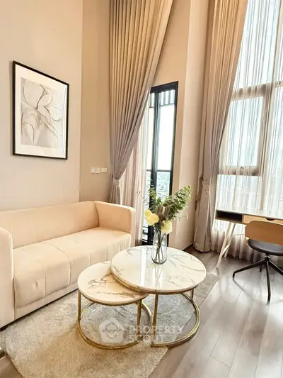 Elegant living room with high ceilings and modern decor