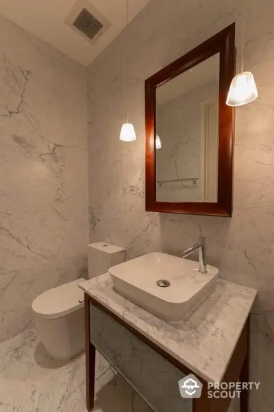 Luxurious marble bathroom with elegant fixtures and modern design