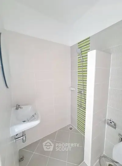 Modern bathroom with sleek shower and stylish tile design